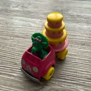 Vintage 1993 Barney and Friends Baby Bop
Birthday Cake Car